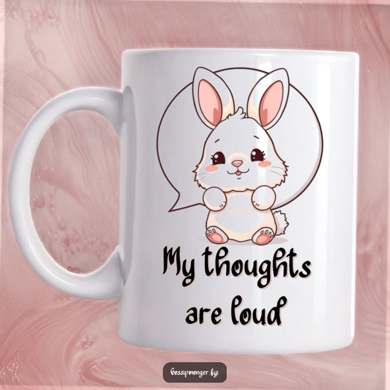 Funny bunny mug with a fluffy rabbit peeking from behind a speech bubble, wiggling its nose in a humorous pose.