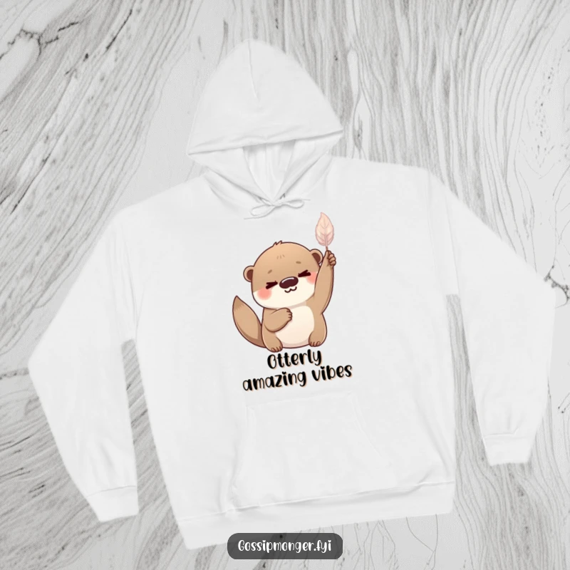 Funny playful otter with a knowing smile, holding a delicate shimmering feather aloft, cozy hoodie.