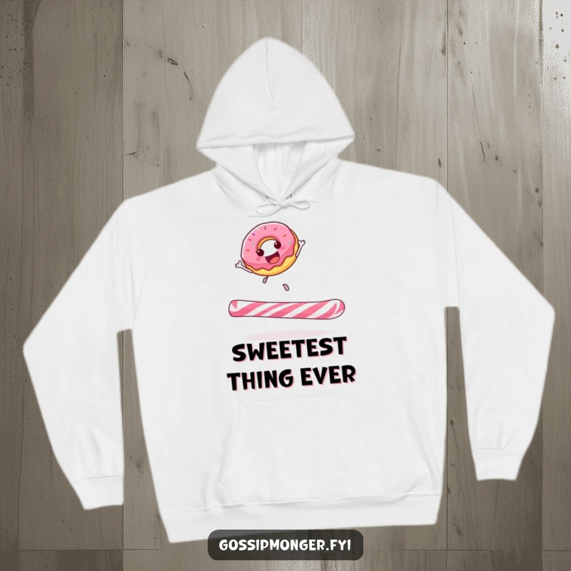 Funny donut hoodie depicting a happy donut ecstatically bouncing on a giant candy cane, perfect for cozy, cheerful moments.