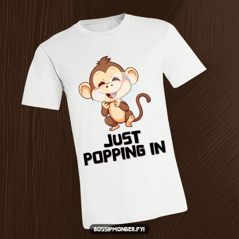 Funny t-shirt featuring a mischievous monkey with a playful grin, blowing a big, shimmering bubble.